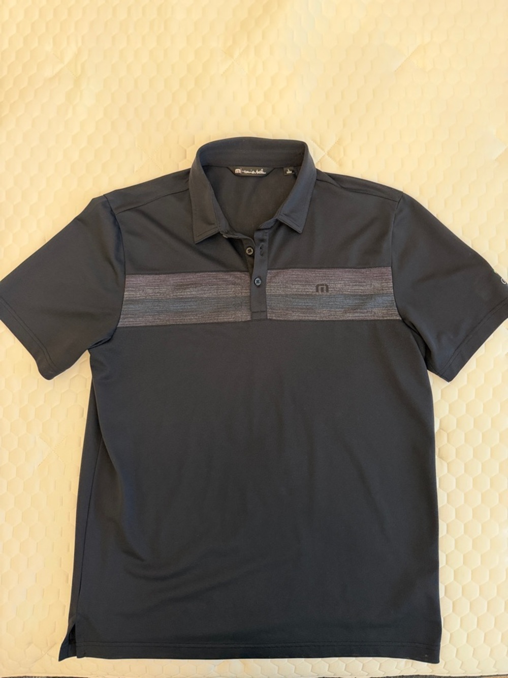 Travis Mathew Navy Polo with Subtle Heathered Chest Stripe